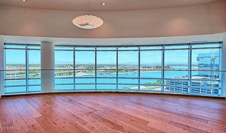 Spacious living area with panoramic lake views at Bridgeview Condos